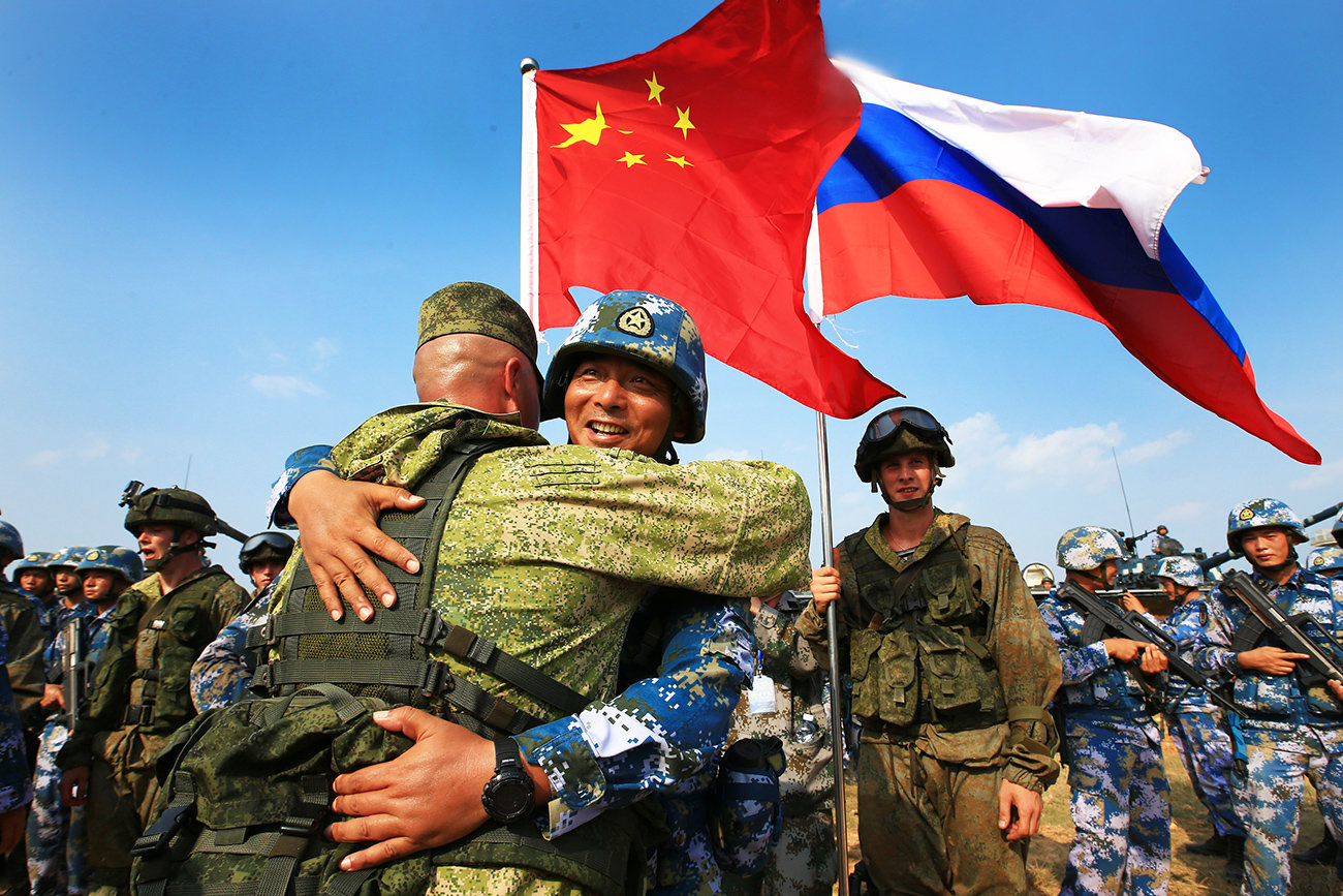 ZHANJIANG, Sept. 14, 2016 (Xinhua) -- Chinese and Russian marines hug during a joint naval drill in Zhanjiang, south China's Guangdong Province, Sept. 14, 2016. China and Russia started ''Joint Sea 2016'' drill off Guangdong Province in the South China Sea on Tuesday. The drill will run until Sept. 19, featuring navy surface ships, submarines, fixed-wing aircraft, helicopters, marines and amphibious armored equipment. (Xinhua/Zha Chunming) (wyo) (Credit Image: Â© Zha Chunming/Xinhua via ZUMA Wire)